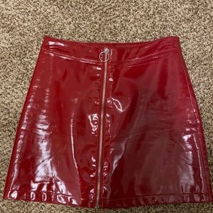 red faux leather skirt
